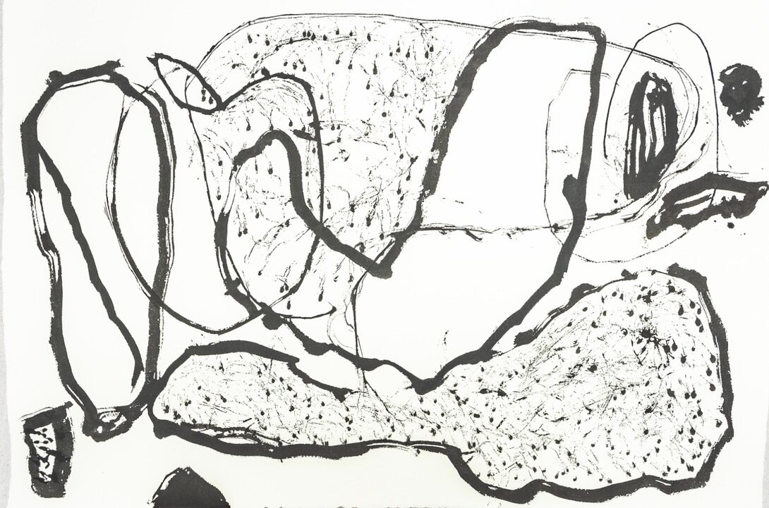 Horizontal black ink drawing with sweeping gestural marks